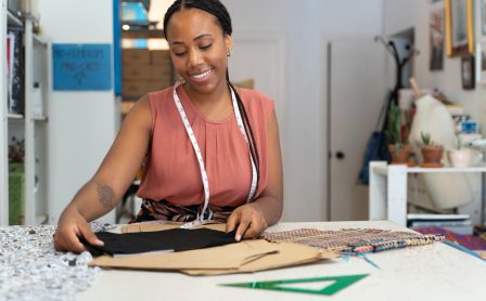 medium-shot-black-woman-running-small-business